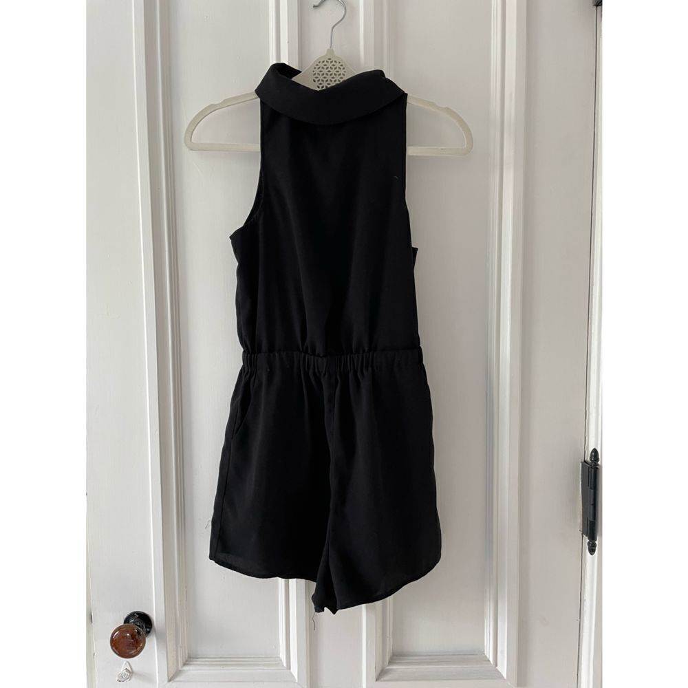 Luvalot size 4 black polyester romper with open back and collar